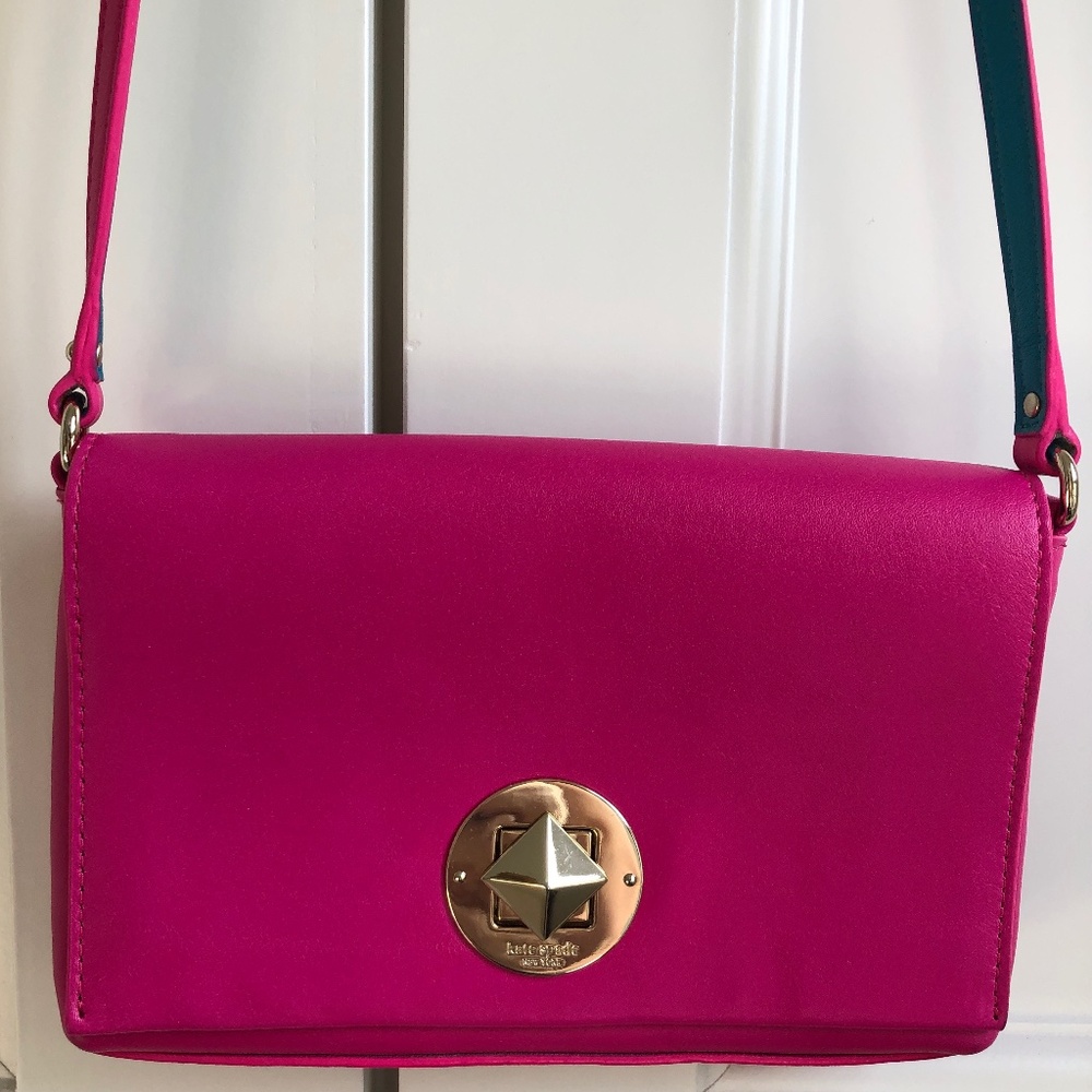 Kate Spade  Pink   8" wide x 5" high  Dust bag included.